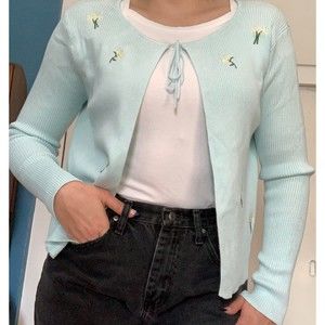 Tie front ribbed knit cardigan with embroidered floral details